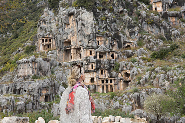 istock Woman explores site of ancient Greek ruin 482403100