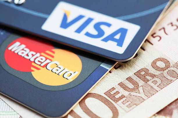 Visa and Mastercard credit cards on Euro banknotes stock photo