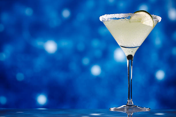 istock margarita  cocktail on star glitter dark blue background 482404938