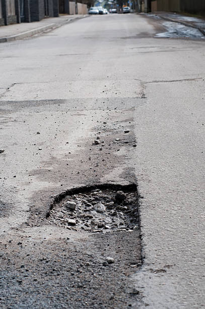 istock Very big pothole on the road 482405287