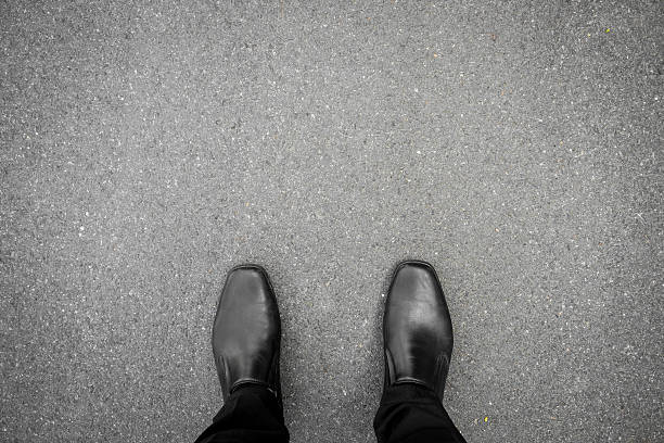 istock Black shoes standing on the floor 482407116