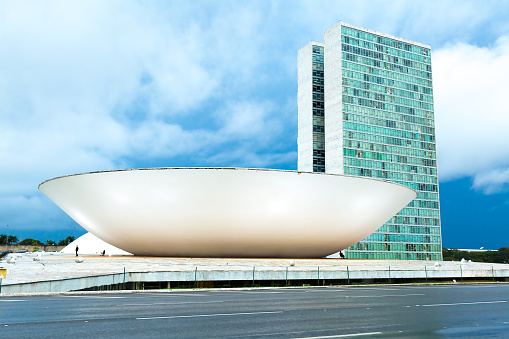 Brasilia, Brazil - March 21, 2015: The famous Brazilian National Congress in Brasilia, Brazil. The building was designed by Oscar Niemeyer in the modern Brazilian style.