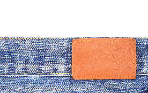 vaqueros etiqueta en blanco de jean tela de cuero - leather belt sewing hide fotografías e imágenes de stock