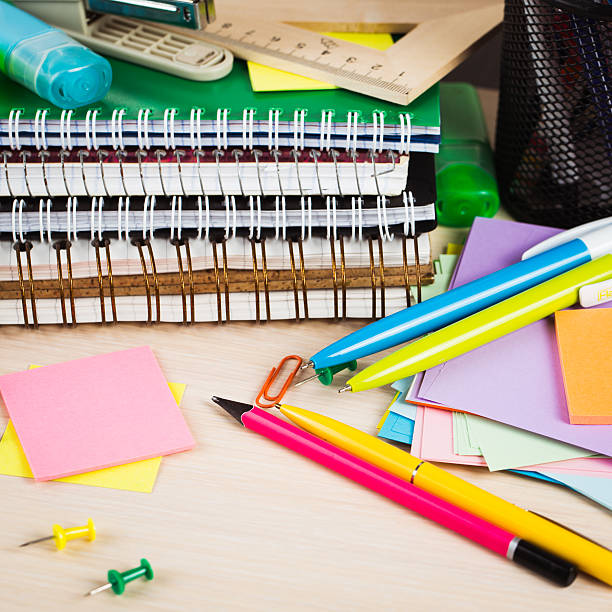 istock School and office accessories on wooden background 482412044