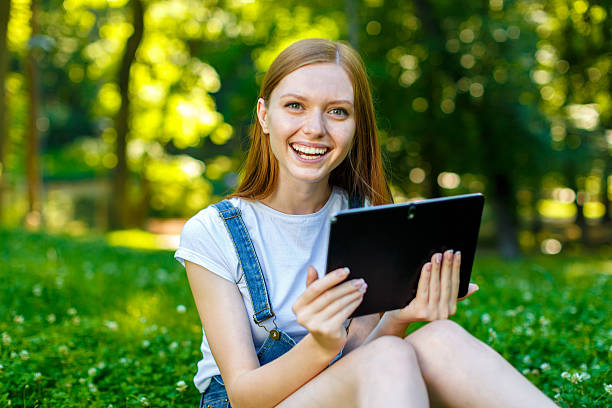 istock Beautiful smiling red-haired young woman 482414816