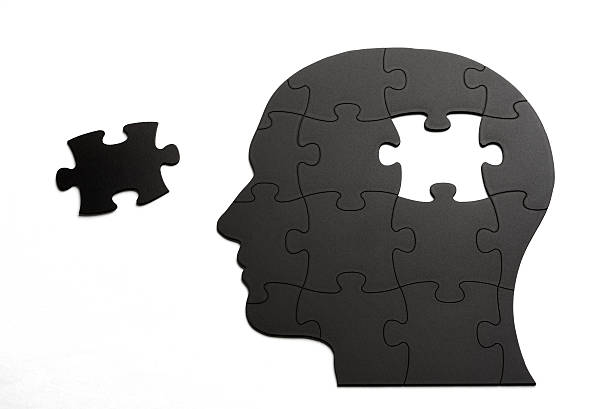 istock puzzle board in shape of human head on white background 482421525