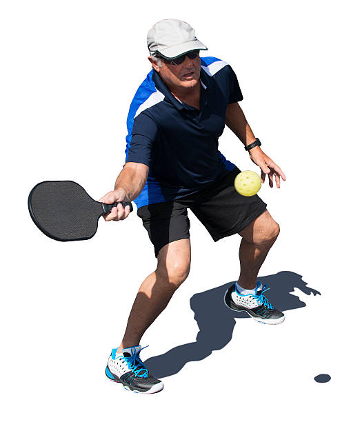 istock Pickleball Action - Senior Man Hitting Forehand Shot 482422408