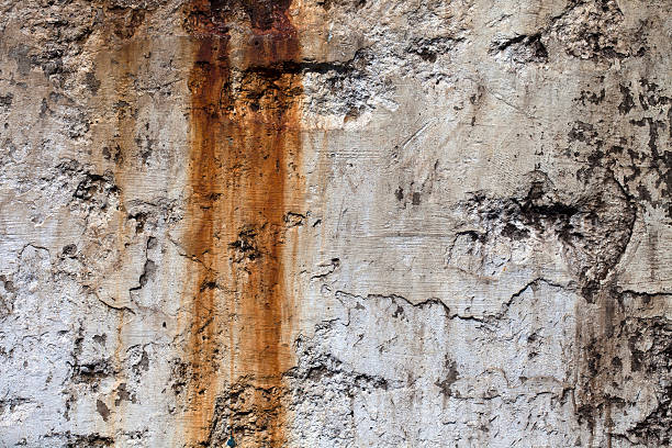 Texture on Concrete Wall with Rust Stain stock photo