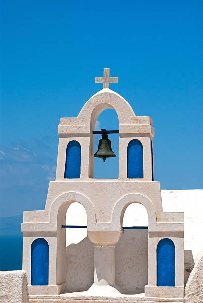 istock Belfry at blue sky on Santorini  island, Greece 482423906
