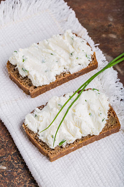 istock Healthy breakfast - homemade bread with goat cheese 482424144