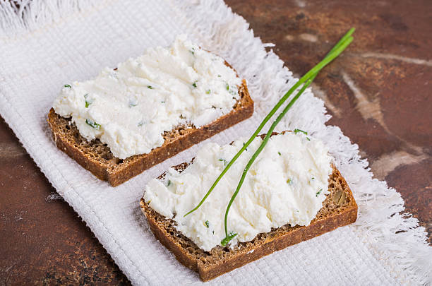 istock Healthy breakfast - homemade bread with goat cheese 482424178