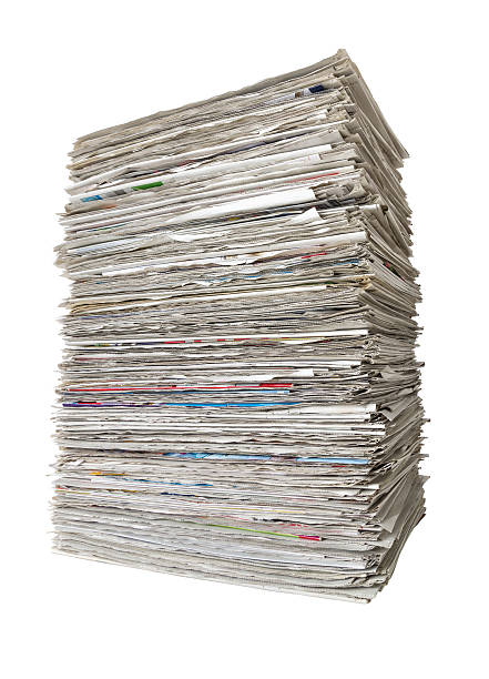 istock Pile of newspapers on a white background 482430350