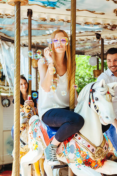 istock Group of friends on the rides with soap bubbles 482436660