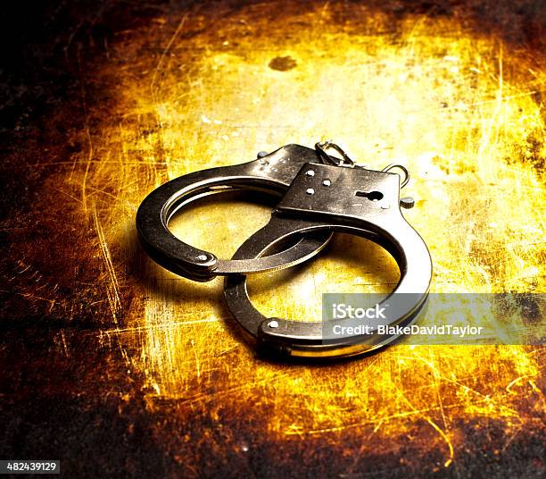 High Dynamic Range Photo Of Handcuffs Stock Photo - Download Image Now - Crime, Dirty, Handcuffs