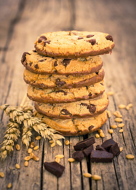 istock Stacked chocolate chip cookies on the wooden table 482440246