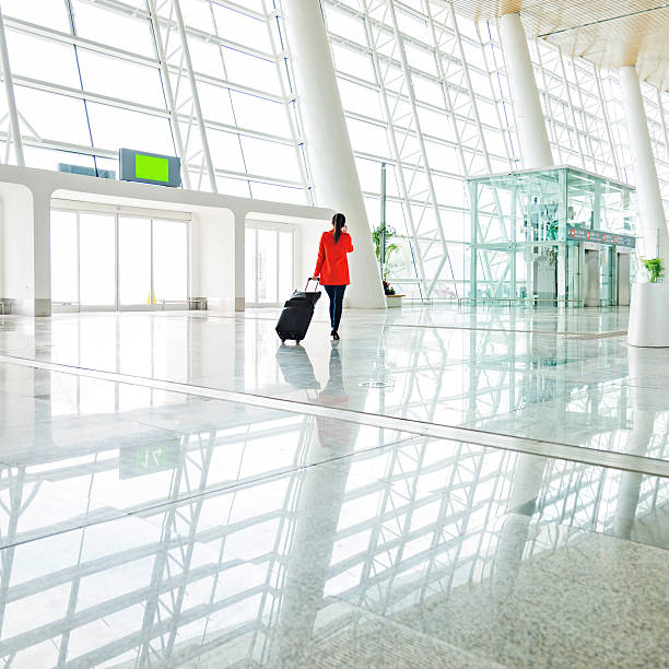 istock woman at airport 482445186