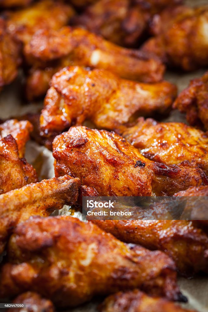 Chicken wings on baking sheet BBQ chicken wings on baking sheet Chicken Wing Stock Photo