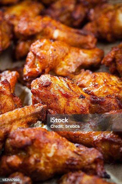 Chicken Wings On Baking Sheet Stock Photo - Download Image Now - Chicken Wing, 2015, American Culture