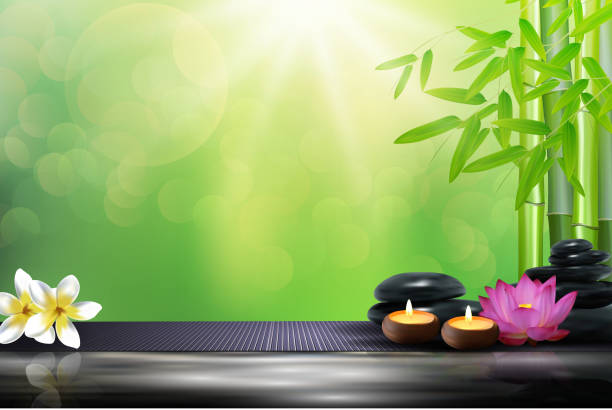 istock Bamboo, flowers, stone, wax and background on the big stone 482447376