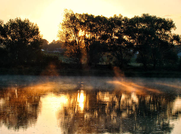 istock Beautiful landscape. River, fog, sunset. 482447412