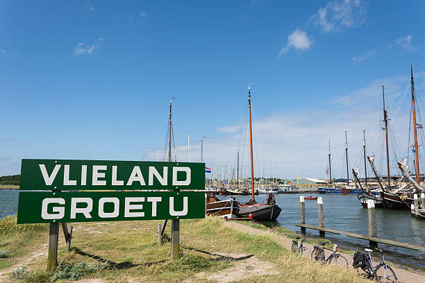 Welcome board on Vlieland Island harbour stock photo