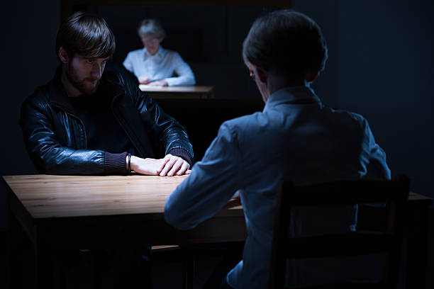 istock Man being questioned by police 482452238