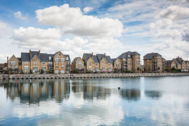 istock Terrrace houses by a marine dock. 482452394