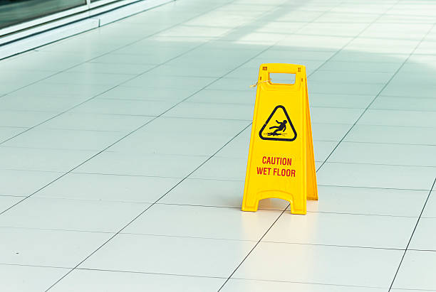 istock Yellow sign that alerts for wet floor. 482452828