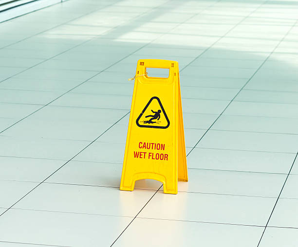 istock Yellow sign that alerts for wet floor. 482452830