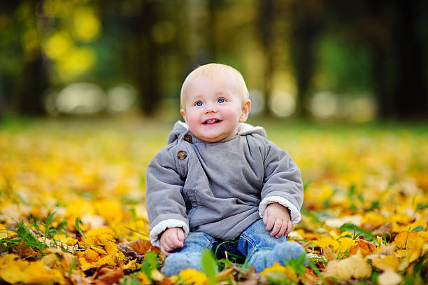 istock Happy baby having fun in the park 482456090