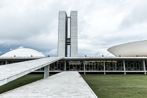 Brasilia, Brazil - March 21, 2015: The famous Brazilian National Congress in Brasilia, Brazil. The building was designed by Oscar Niemeyer in the modern Brazilian style.