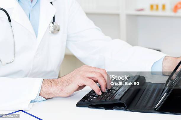 Doctor With Digital Tablet Stock Photo - Download Image Now - Adult, Adults Only, Care