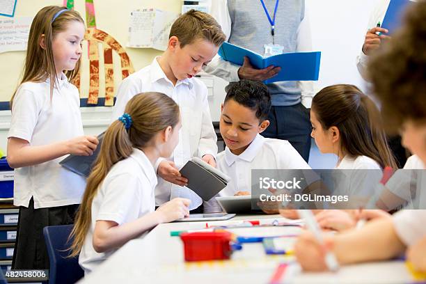 Happy At School Stock Photo - Download Image Now - School Children, Classroom, Uniform