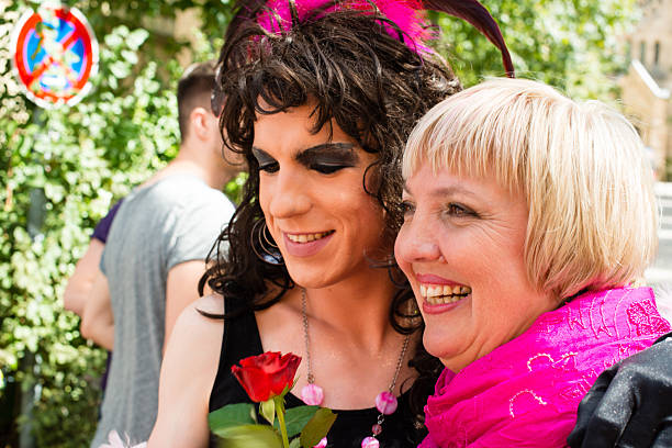 Stuttgart, Germany - July 25, 2015: Claudia Roth of the German Green Party is posing with a participant of the Christopher Street Day 2015 in Stuttgart. Claudia Roth was one of the two party chairs of the German Green Party from 2004 to 2013 and currently serves as one of the vice presidents of the Bundestag. The Christopher Street Day in Stuttgart is the largest gay and lesbian pride in southern Germany, attracting more than 200.000 people. 