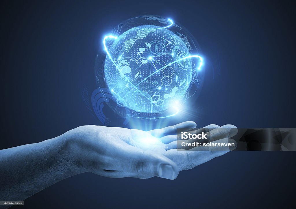 Projecting The Future Projecting The Future. A hand holding a holographic projection. Globe - Navigational Equipment Stock Photo