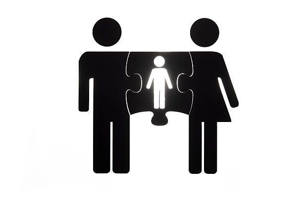 istock Figures of couple with children puzzle 482461761