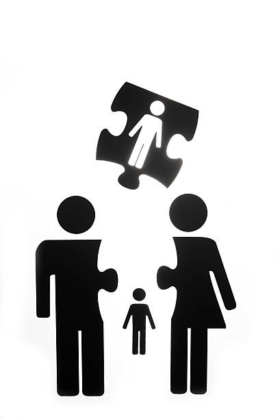 istock Figures of couple with children puzzle 482461765