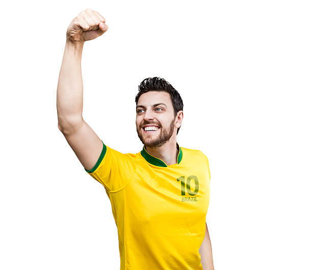 istock Brazilian fan celebrate on white background 482463597