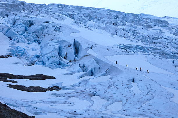 istock Climbers walking on a glacier - Jostedal, Norway 482463837