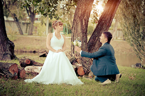 istock bride and groom in the park, a wedding bouquet, 482468223