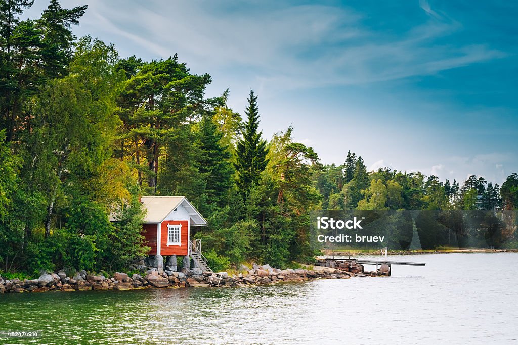 Red Finnish Wooden Bath Sauna Log Cabin In Summer Red Finnish Wooden Sauna Log Cabin On Island In Summer Finland Stock Photo