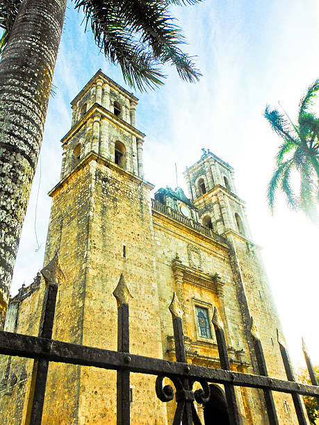 istock Spanish Catholic Church with Palm Trees and Gate 482475795