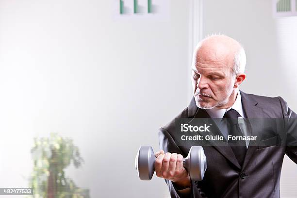 Weightlifting Business Man In Action Stock Photo - Download Image Now - Achievement, Adult, Adults Only