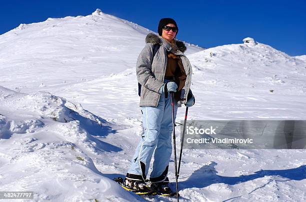 Girl Stands On Snow About Peak Stock Photo - Download Image Now - Active Lifestyle, Activity, Adult
