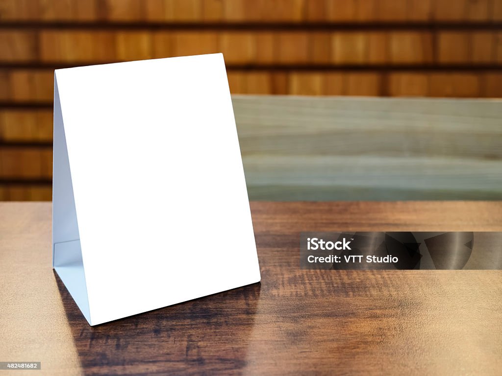 Mock up Menu Frame template on table in Restaurant cafe Mock up Menu Frame template on wooden table in Restaurant cafe background Poster Stock Photo