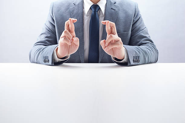 istock Businessman Double Fingers Crossed 482481899
