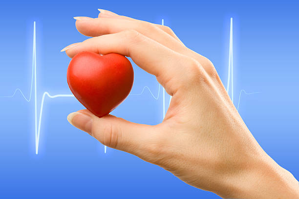 istock Female hand with red heart 482484224