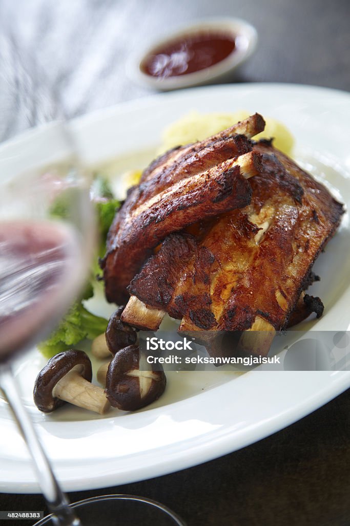 pork rib grill and red wine pork rib grill and red wine in sun light Affectionate Stock Photo