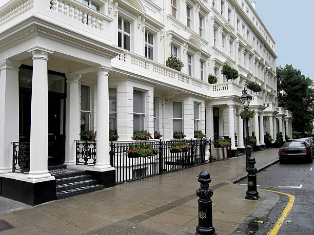 London street Typical upper class Victorian townhouses of the type seen in many streets in Belgravia and Kensington kensington and chelsea stock pictures, royalty-free photos & images