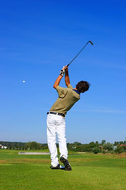 istock Golf, teenager golfer striking the ball 482490543